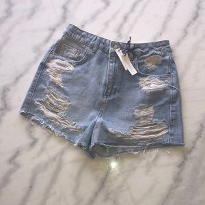 NEW Topshop jean shorts with rips